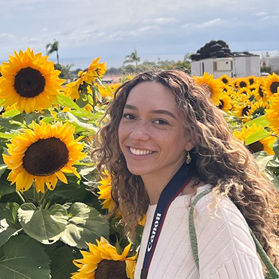 Amara in field of sunflowers